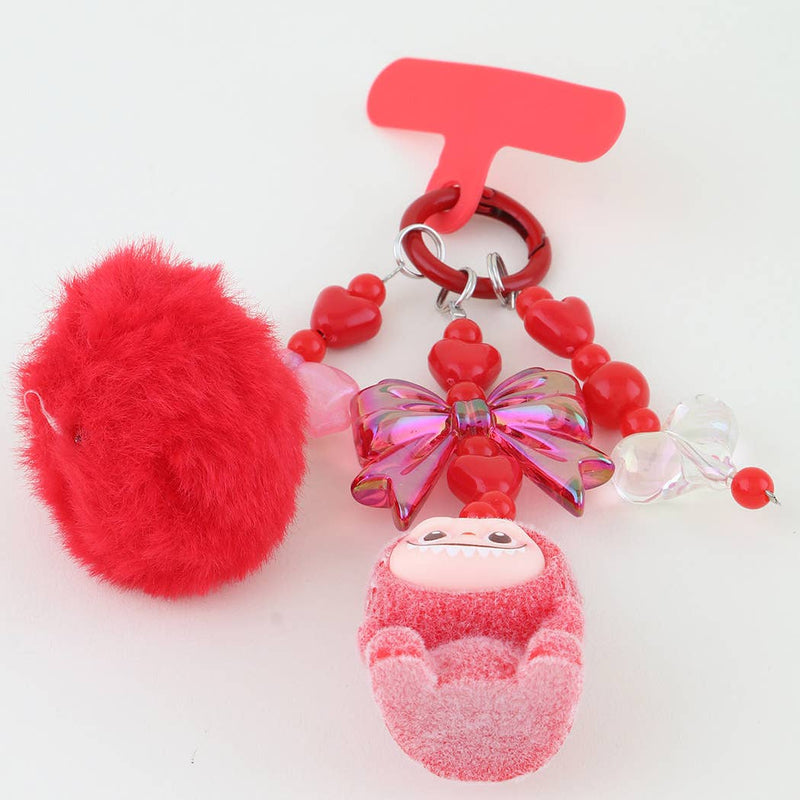 This is a Multi Ribbon Doll Beaded Bag Charm: YL | WILD FLIER GIFTS AND APPAREL