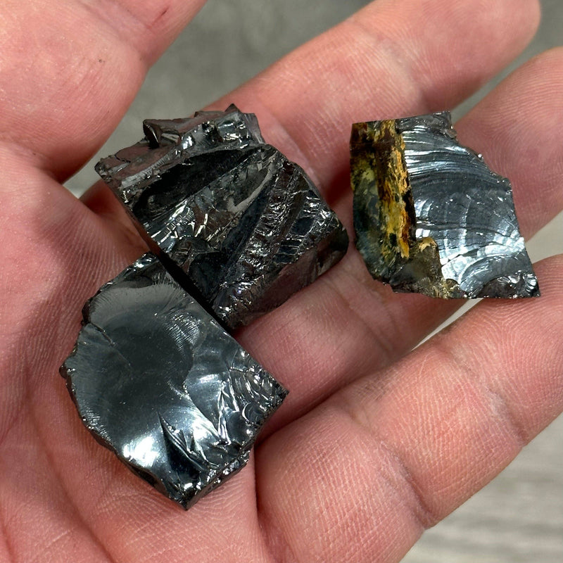 Elite Shungite Raw Stones – 100 Gram Lot Wholesale | WILD FLIER GIFTS AND APPAREL